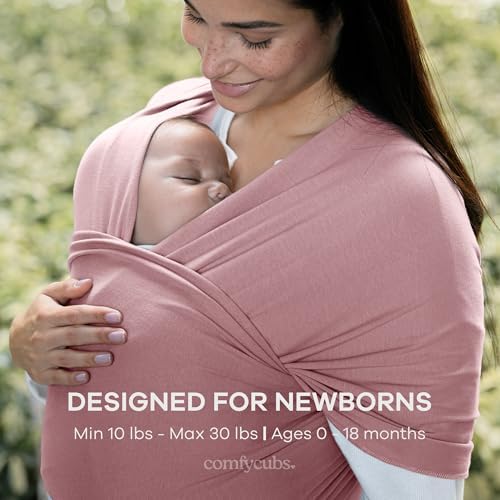Caregiver demonstrating the hands-free convenience of the adjustable mauve baby wrap.