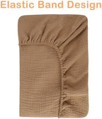 Two pack muslin baby changing pad covers folded neatly