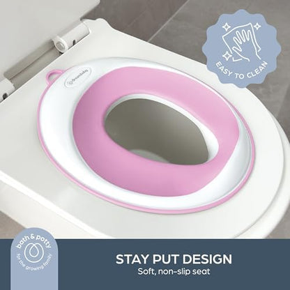 Dreambaby portable travel potty seat showing the elongated fourteen point five inch contoured shape