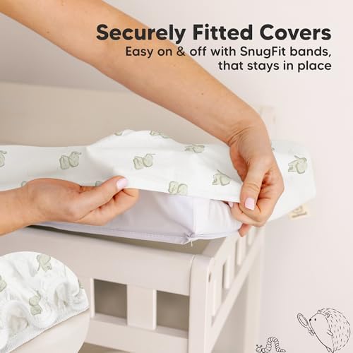 Gender neutral elephant print diaper changing table liners displayed in a modern nursery setting