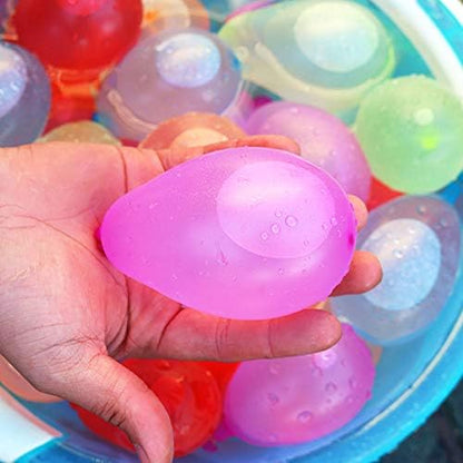 Vibrant multicolor pile of filled Elitoky latex water bombs ready for an outdoor backyard splash party
