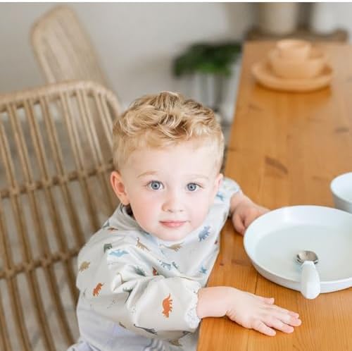 Tiny Twinkle baby led weaning sleeved bib close up of the no scratch closure