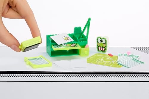 Detailed close-up of working miniature stamps and desk organizers from Series 3
