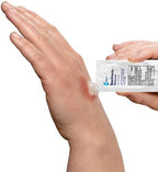 Globe first aid antibiotic zinc ointment packet being opened for application on a scrape