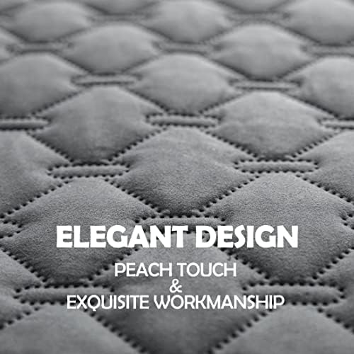 Water droplets pooling on the machine washable liquid barrier fabric without soaking through.
