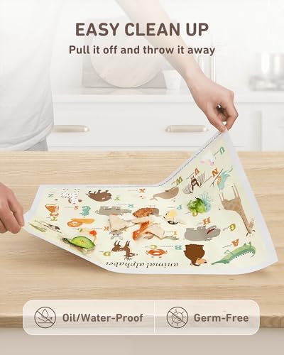Waterproof baby placemat protecting a restaurant dining table from messy food spills and stains