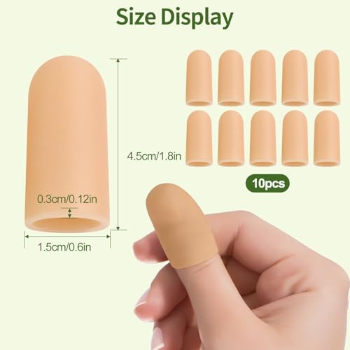 Silicone finger sleeve protectors being trimmed with scissors for a custom fit
