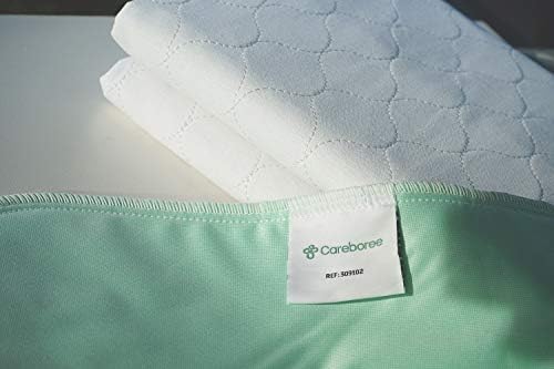 Close up view of the triple layer fabric construction of the Careboree incontinence protector highlighting the cotton top.