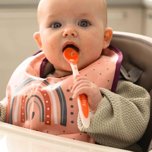 Assorted vibrant colors of Nuby long handle infant spoons displayed together.