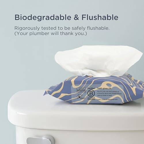 Saalt biodegradable wipes being used to clean a menstrual cup.