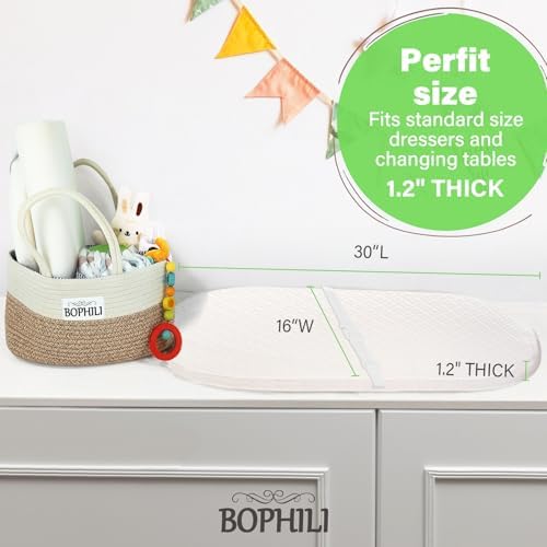 Bophili 30 by 16 inch changing table pad in use inside a basket