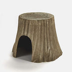 Kaytee natural tree trunk hideout placed inside a guinea pig cage setup