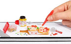 MGA's Miniverse Sanrio replica food ingredients and miniature recipe card laid out