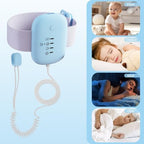 Tobiwibby rechargeable bedwetting alarm showing the USB charging port and elastic armband.