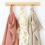 Treela muslin cover used as a protective car seat canopy