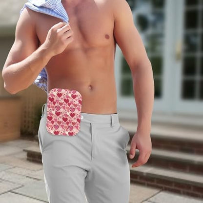 Washable ileostomy pouch decorative sleeve in a strawberry heart print.