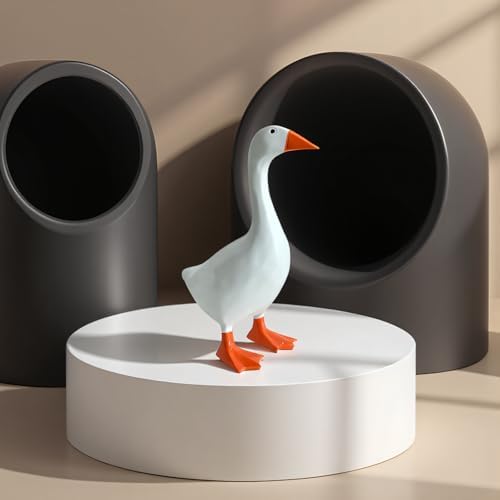 Desk goose statue on a wooden bookshelf
