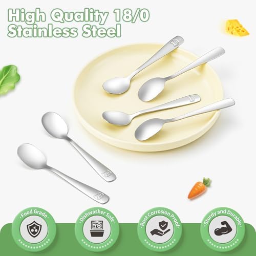DRKIO toddler utensils showing the detailed embossed kitten and animal motifs on the handles