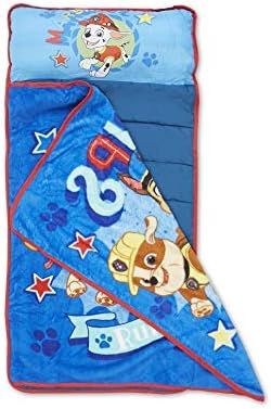 Toddler using Paw Patrol nap mat with built in pillow