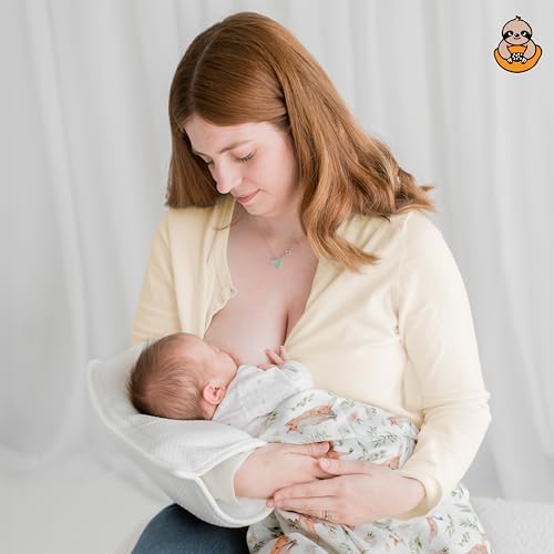 Povkufii nursing arm pillow showing ergonomic shape for newborn support