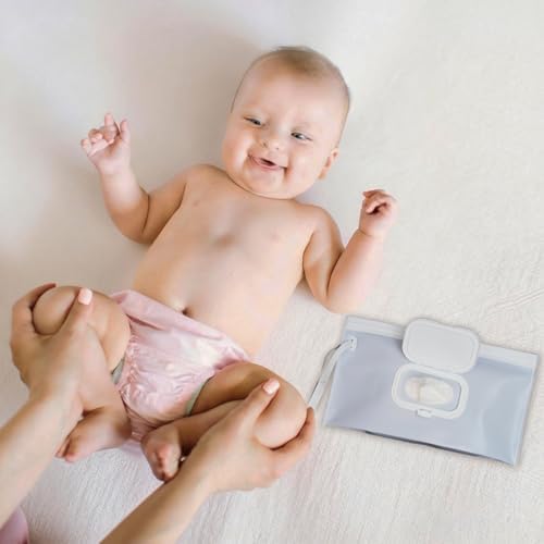 Reusable baby wipes pouch hanging from a diaper bag strap