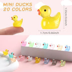 Colorful miniature resin ducks glowing in a dark environment.