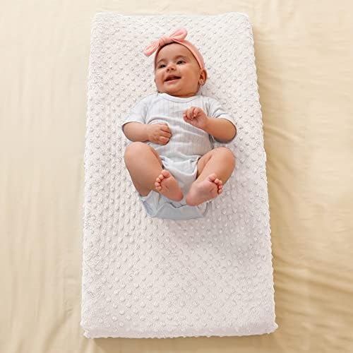 Queness baby changing pad cover packaging and label details