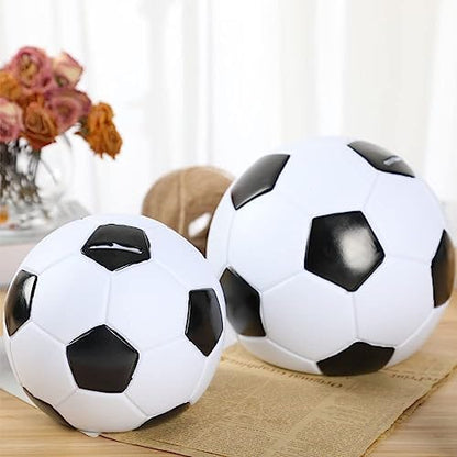 H&W unbreakable plastic soccer money box being held by a young child