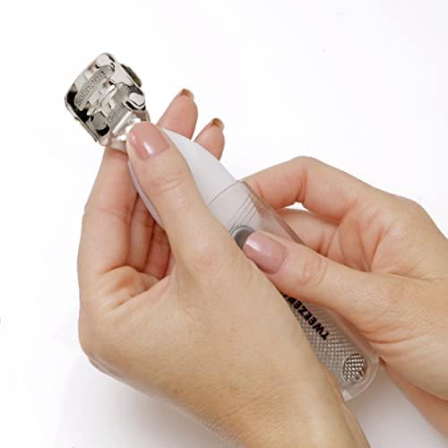 Tweezerman callus remover with safety lock mechanism engaged for secure storage.