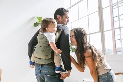 Tula Lite travel carrier demonstrating storage pouch and compact portability features.