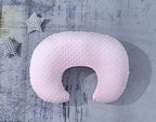 Baby using Donomilo pillow for tummy time support