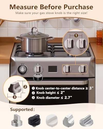 Black stove knob covers installed on a modern gas stove