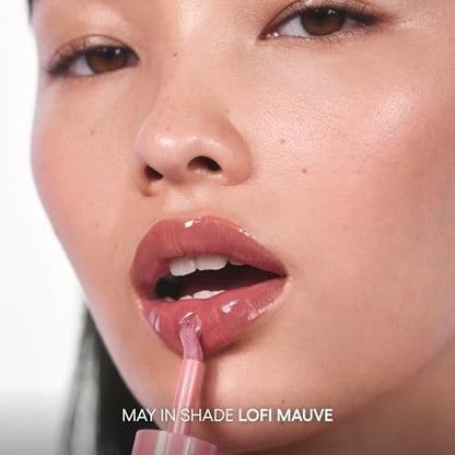 Glossy water-to-oil liquid formula texture swatch of LANEIGE JuicePop Box Lip Tint Lo-Fi Mauve