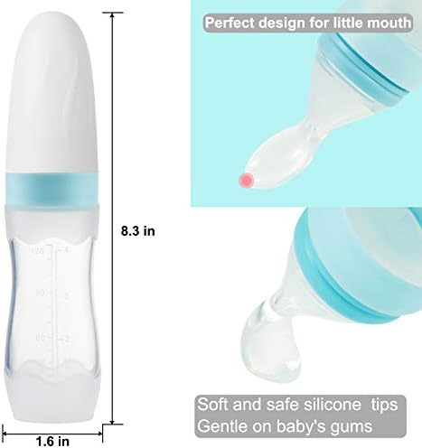 Infant fruit squeeze feeder bottle standing upright with protective cap attached