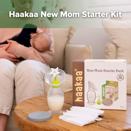 Close-up of the food-grade silicone manual breast pump with suction base and flower stopper attached to prevent leaks.