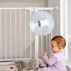Pressure mounted safety gate extension kit applied to a pet gate near stairs.