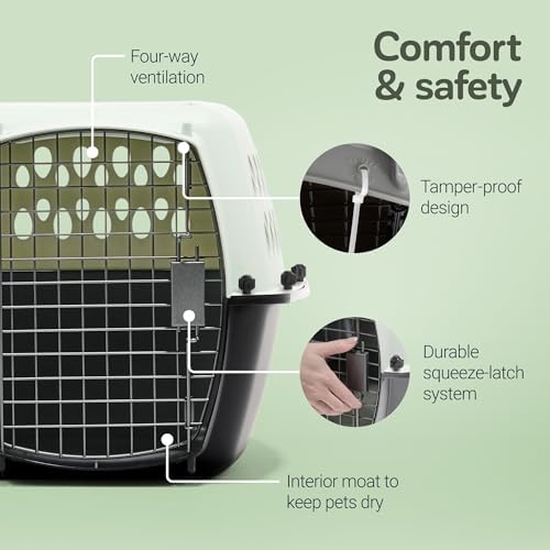 Petmate portable pet kennel top perspective highlighting the heavy duty fold down carrying handle for easy transport.