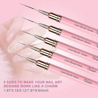 Professional nail artist using Voiluk liner brush for fine line drawing