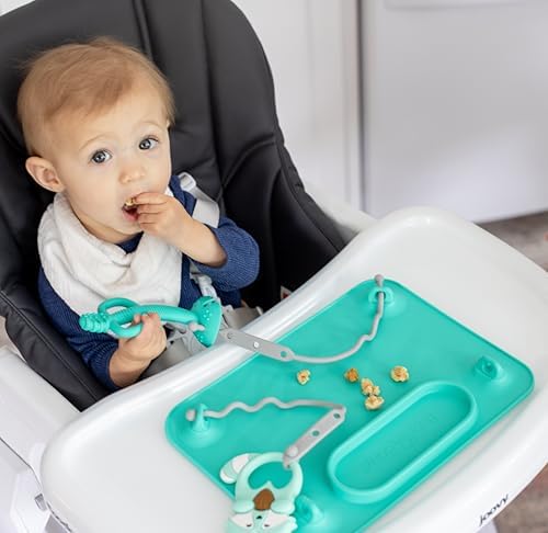 Busy Baby food grade silicone placemat attached to a smooth high chair tray.