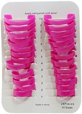 Ten different sizes of U-shaped manicure cuticle guards displayed on a flat surface
