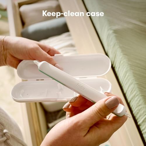 Frida Baby nail cleaner tool showing the specialized tip for under-nail dirt