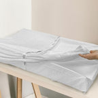 Fond + Found nursery changing pad showing raised safety walls