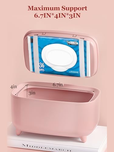 Travel friendly baby wipe heater plugged in on nursery table