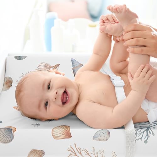 Side angle of the fitted changing pad cover highlighting elasticized edges.