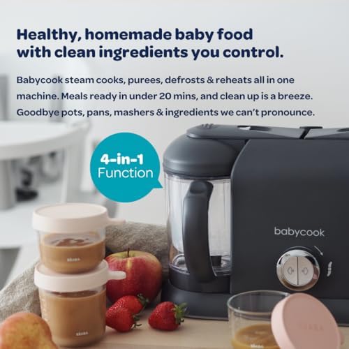 Béaba 4 in 1 baby food station with open lids displaying steaming baskets