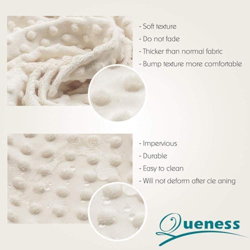 Queness beige diaper changing table sheet texture closeup