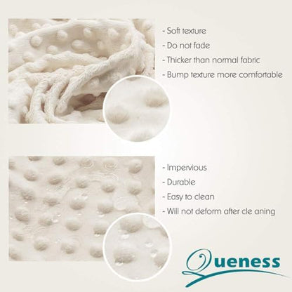 Queness minky dot changing table cover folded on display