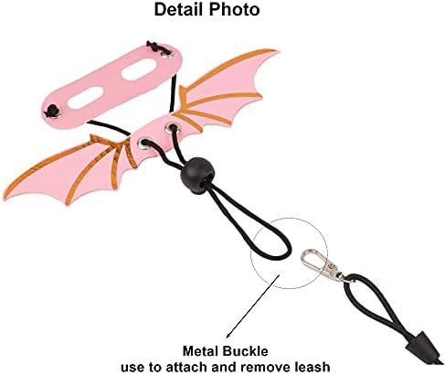 Bearded dragon wearing pink wing harness outdoors
