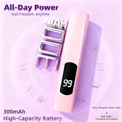 White mini LED nail dryer flash curing a rhinestone gel extension design on a fingernail