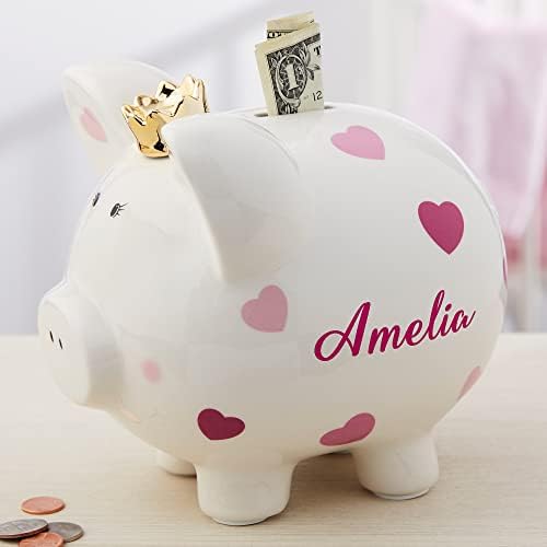 Bottom view of the Personalization Universe large pink piggy bank focusing on the removable plastic stopper plug for easy money retrieval